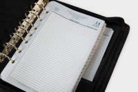 ROLLS-ROYCE / BENTLEY: A Rolls-Royce branded Battery Conditioner in original bag & a Bentley labelled daily planner made by FranklinCovey [Location: Melbourne] - 2