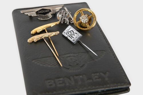 BRITISH: A group of small Jaguar, Rolls-Royce & Bentley items, includes some badge pins and a small leather Bentley wallet [Location: Melbourne]