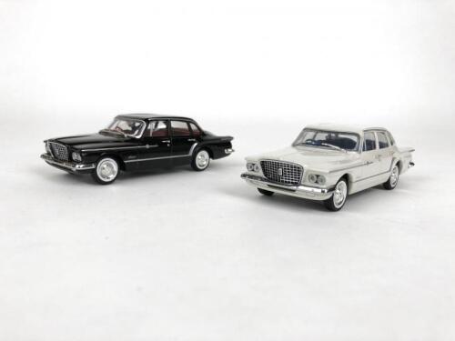 CHRYSLER: Pair of 1:43 scale Chrysler Valiant R & S Sedan produced by Trax. (NB description)