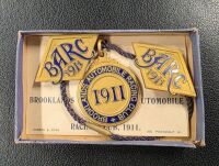 BROOKLANDS: A set of three 1911 Brooklands BARC membership lapel badges and medallion, No. 1688 [Location: Perth] - 2