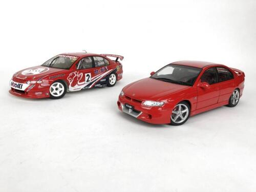 HOLDEN: Pair of 1:18 scale Holden Commodore cars produced by AutoArt. (NB description)