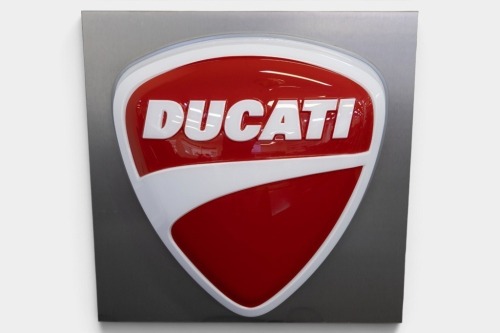 DUCATTI: A large original circa late 2000s Ducati 'Guitar Pick Logo' dealership light box, measures 89cm high, 89cm wide & approximately 25cm deep
