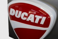 DUCATTI: A large original circa late 2000s Ducati 'Guitar Pick Logo' dealership light box, measures 89cm high, 89cm wide & approximately 25cm deep - 2