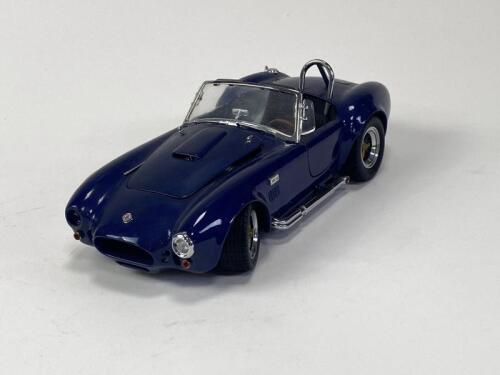 FORD: 1:18 scale Ford Cobra 427 produced by Kyosho in dark blue. (NB description)