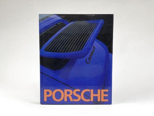 PORSCHE: A large hardcover book on Porsche cars.