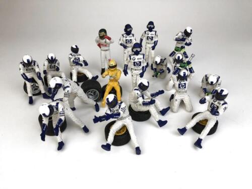 PIT CREW FIGURES: Group of 1:18 racing car pit crew figures and driver figures. (NB description)