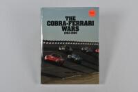 COBRA-FERRARI: 'The Cobra-Ferrari Wars 1963-1965' hardcover book. Authored and signed by Michael L.Shoen