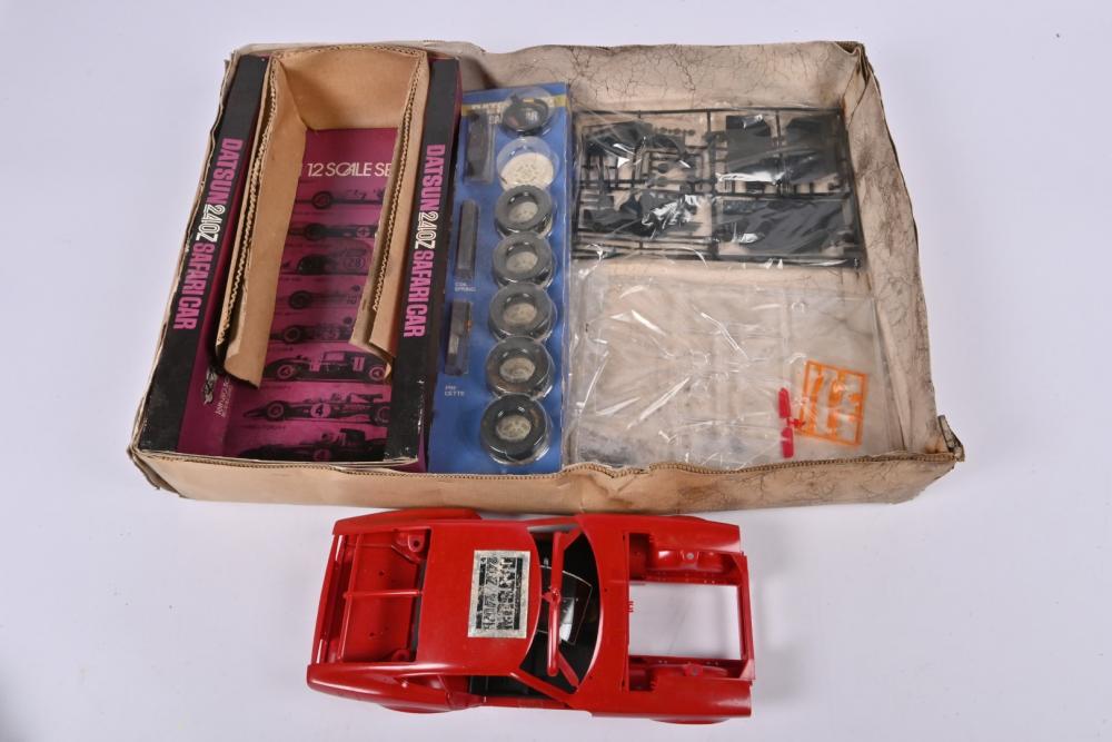 DATSUN: A Tamiya 1:12 scale Datsun 240Z Safari Car plastic model kit -  Price Estimate: $ - $