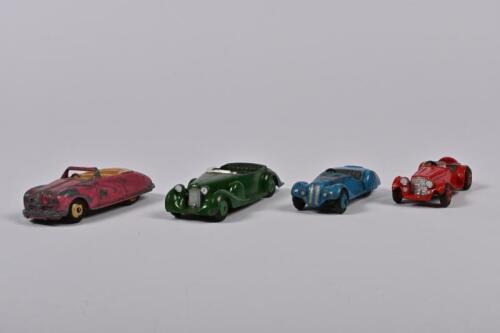 DINKY TOYS: Four Dinky Toys. Austin, Fraser-Nash, Jaguar, Lagonda