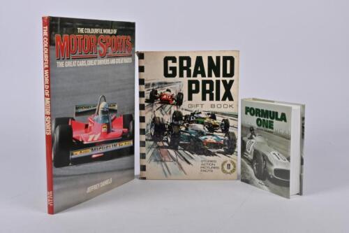 MOTOR SPORTS: Three hardcover books detailing motor sports