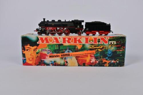 MARKLIN-HAMO: A circa 1970s Marklin-Hamo two rail 8393 4-6-2 steam outline locomotive and bogie tender, boxed