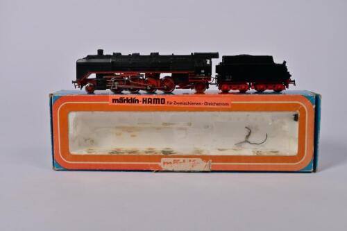 MARKLIN-HAMO: A circa 1970s Marklin-Hamo two rail 8382 2-8-2 steam outline locomotive and bogie tender, boxed