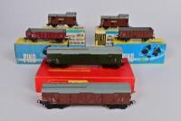 PIKO: Six 1970s Piko H0 rolling stock including; two 5/6406-18open wagons boxed; two 5/6452-01 brake vans boxed; together with two bogie goods wagons, with incorrect box.