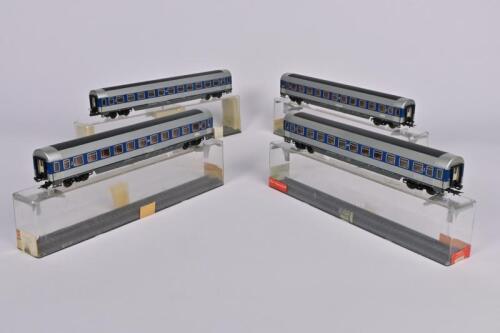 ROWA: Four Rowa German outline second class coaches in silver/blue, all with full interiors