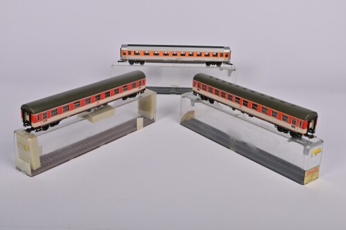 ROWA: Three Rowa German outline coaches, in red, silver and orange livery, all with full interior