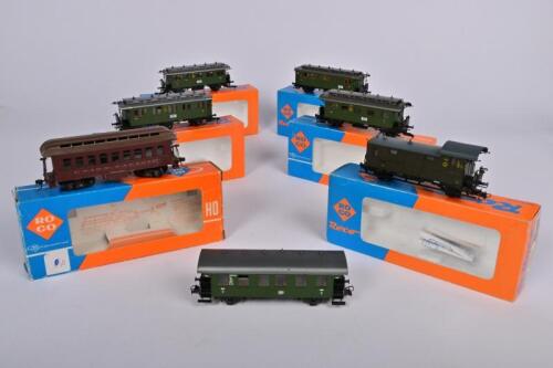 ROCO: Seven Roco four wheel suburban coaches, including the German produced 4208, 4207, 4206S , 4207S, 44230 and an American 4200, one unboxed.