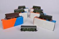 ROCO: Seven Roco four wheel suburban coaches, including the German produced 4208, 4207, 4206S , 4207S, 44230 and an American 4200, one unboxed. - 2