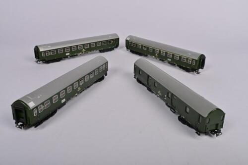 SCHICHT: Four Schicht HO DR passenger coaches, including one postal car, unboxed and in good condition