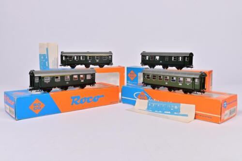 ROCO: Four Roco 6-wheel DB coaches, one 1st class 4214B, two 2nd class 4214S/4215 and one baggage car 4216, all boxed