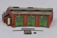 TRACK SIDE BUILDINGS: Three track side buildings including station by Kibri, and two engine sheds by Vollmer, some parts detached and lacking - 5