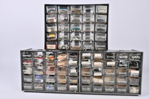 SPARE PARTS: Three cases of spare parts, including wheels, bogies, diodes, lights, screws and nuts etc.