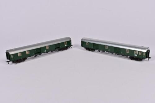 FLEISCHMANN: Two Fleischmann DB baggage cars, unboxed and one sticky residue to side, lacking box, loose bogies