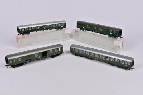 FLEISCHMANN: Four Fleischmann DB coaches including a baggage, postal and two second class coaches including one Scharnow, two non original boxes