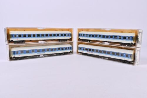 FLEISCHMANN: Four Fleischmann coaches all blue/silver, two second class, one kinderland and one bistro caf&eacute;, all excellent boxed condition