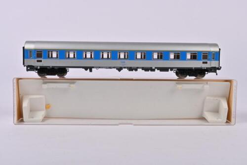 FLEISCHMANN: A Fleischmann Austrian passenger coach, royal blue/silver, missing one coupling