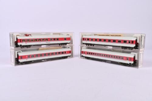 FLEISCHMANN: A rake of four German Fleischmann passenger coaches, two first class, one second class and one restaurant car, all boxed with full interiors