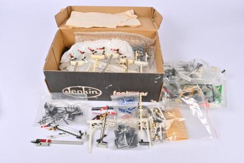 TRI-ANG: A large quantity of track side accessories including signals, signal gantries, lights and all manner of lineside accessories by Tri-Ang