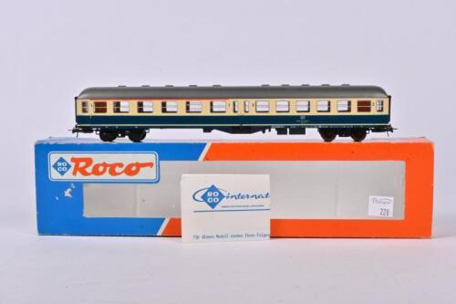 ROCO: A Roco German passenger coach in dark blue/cream, 1st and 2nd class with full interior