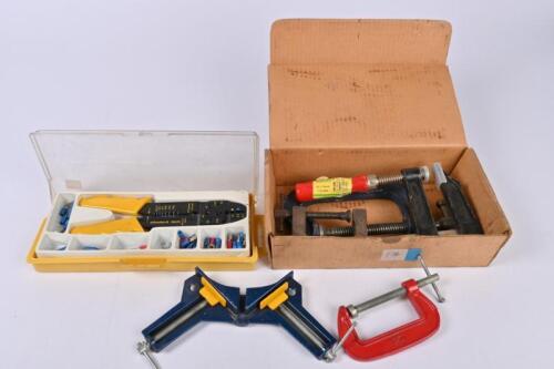 TOOLS: A wire stripper/crimper and a box of five clamps