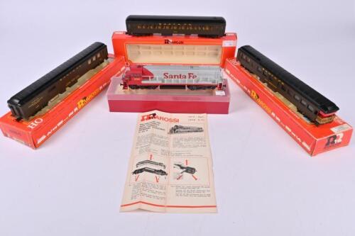 RIVAROSSI: A Rivarossi 1832 Santa Fe 6x6 Diesel loco plus three coaches - 1464 Pullman, caf&eacute; observation car and 2602 post office car, all very good boxed