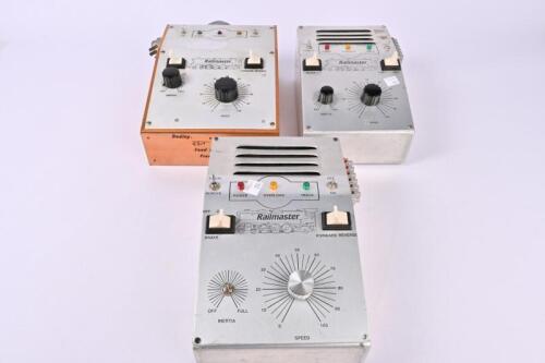 TRANSFORMERS/CONTROL UNITS: Three Railmaster control/transformers 12V DC + 15V AC for accessories