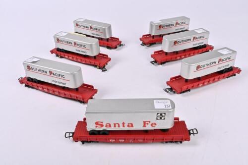 RIVAROSSI: Six Rivarossi Southern Pacific and one Santa Fe flat car with piggyback trailer van box