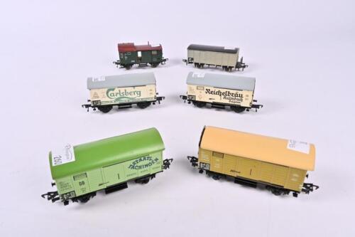 FLEISCHMANN: Four Fleischmann 1210/1211/1213/1214/ beer wagons and two Fleischmann 1474/5301 goods wagons, one with full interior