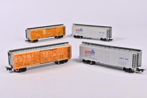RIVAROSSI: Four Rivarossi 12300 freight wagons, two refridgerated ThermIce wagons and two Union Pacific cattle wagons