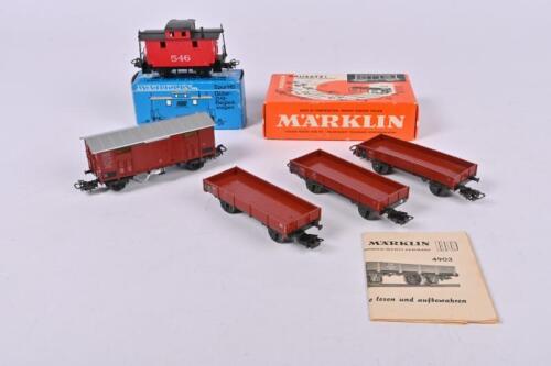 MARKLIN: Five M&auml;rklin H0 wagons, comprising three Marklin 4903 DB open wagons, a A Marklin 4578 US railroad bobber caboose and a Marklin good wagon
