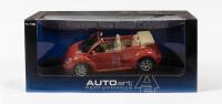VOLKSWAGEN: A NOS 1:18 scale Volkswagen New Beetle cabriolet