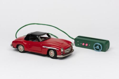 MERCEDES: A Japanese R/C battery operated tin toy of a Mercedes Benz 190 SL 2-Door Roadster