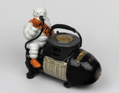 MICHELIN: A small 110 volt Bibendum figured compressor, French circa 1928