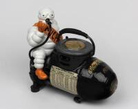 MICHELIN: A small 110 volt Bibendum figured compressor, French circa 1928
