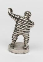MICHELIN: A reproduction solid metal figure of Bibendum after the original car mascot from the 1920s - 2