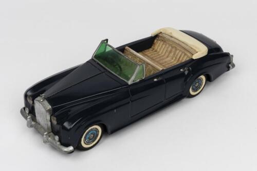 ROLL ROYCE: A 1960s Japanese friction operated tin toy of a Rolls-Royce Silver Cloud 4-door convertible by Bandai (30cm long)
