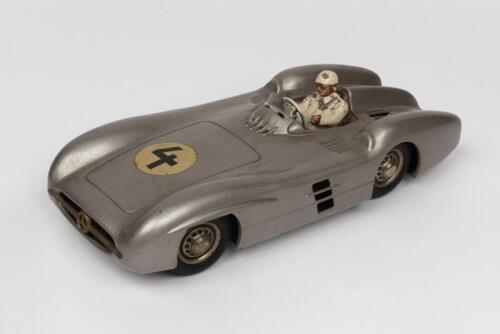 MERCEDES: A 1950s West German friction operated tin toy of a Mercedes Benz Streamliner W196 (27cm long)