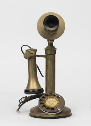 TELEPHONES: A reproduction brass candlestick telephone, late 20th century