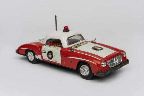 MERCEDES: A 1950s Japanese battery operated tin toy of a Police Mercedes Benz 190 SL 2-Door Roadster