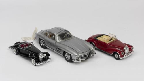 MERCEDES: A 1980s model of a Mercedes Benz Gullwing 300 SL 2-door Roadster by Franklin Mint
