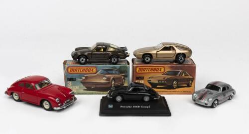 PORSCHE: Two 1970s scale model toys of a Porsche by Matchbox and three others